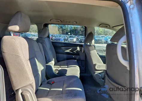 2014 Honda Odyssey Lx z USA, uszkodzony, nr VIN 5FNRL5H25EB026622